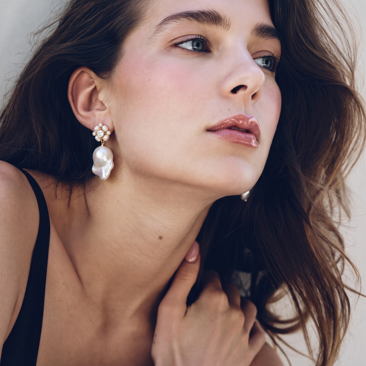 Rosette Baroque Pearl Drop Earrings by ORAÉ — close-up shot