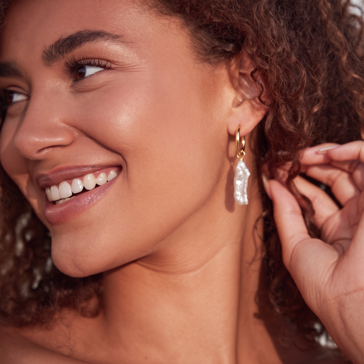 Luna Long Baroque Pearl Earrings by ORAÉ — detail view