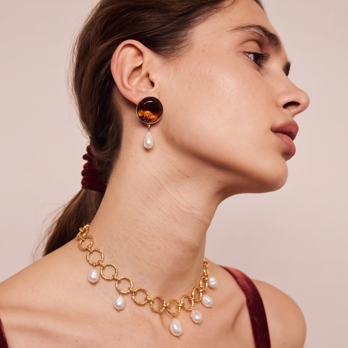 Gilded Orbit Baroque Pearl Necklace by ORAÉ — close-up shot