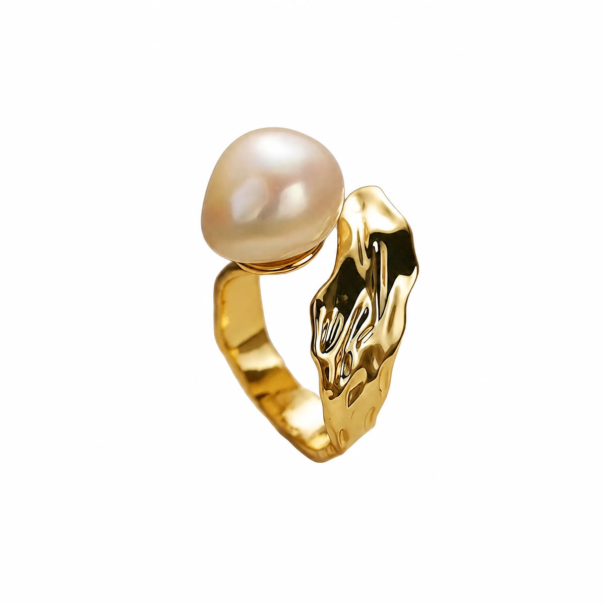 Gold organic open ring with a round pearl and a lava-textured metal band, flat lay on white background