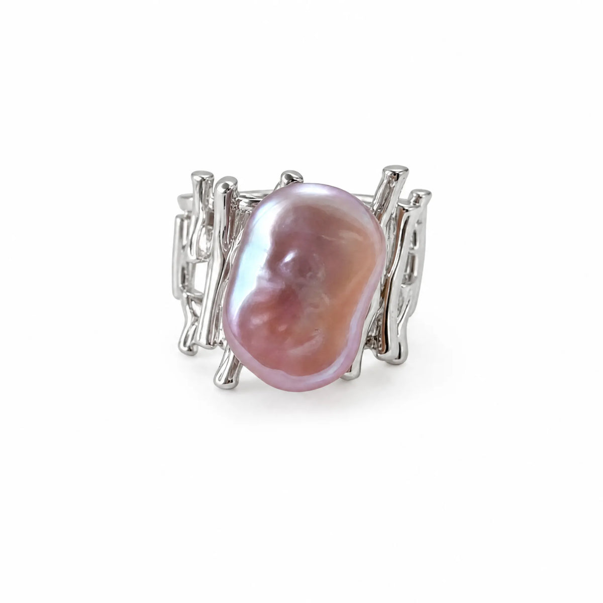 Silver open ring with a bar-cage design and a flat lavender-pink baroque pearl, flat lay on white background